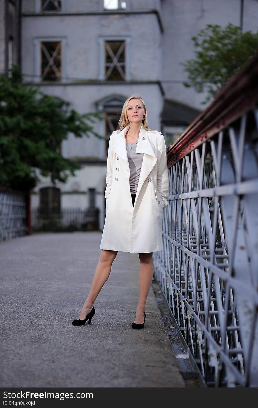 A woman on a bridge.