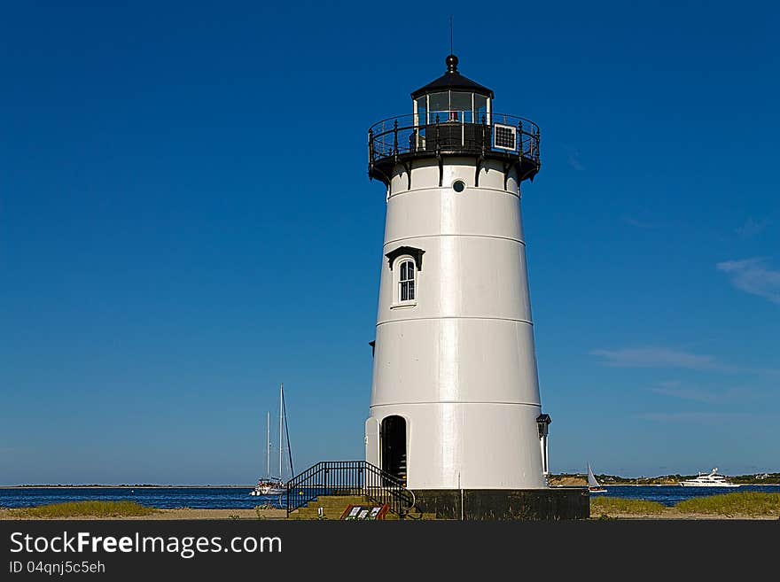 The Edgartown light house with a blue sky in the background