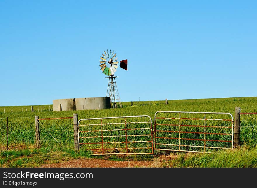 Landscape with windmill water pump on a farm westerncape south africa