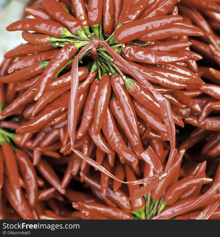 Red peppers for sale at a market.