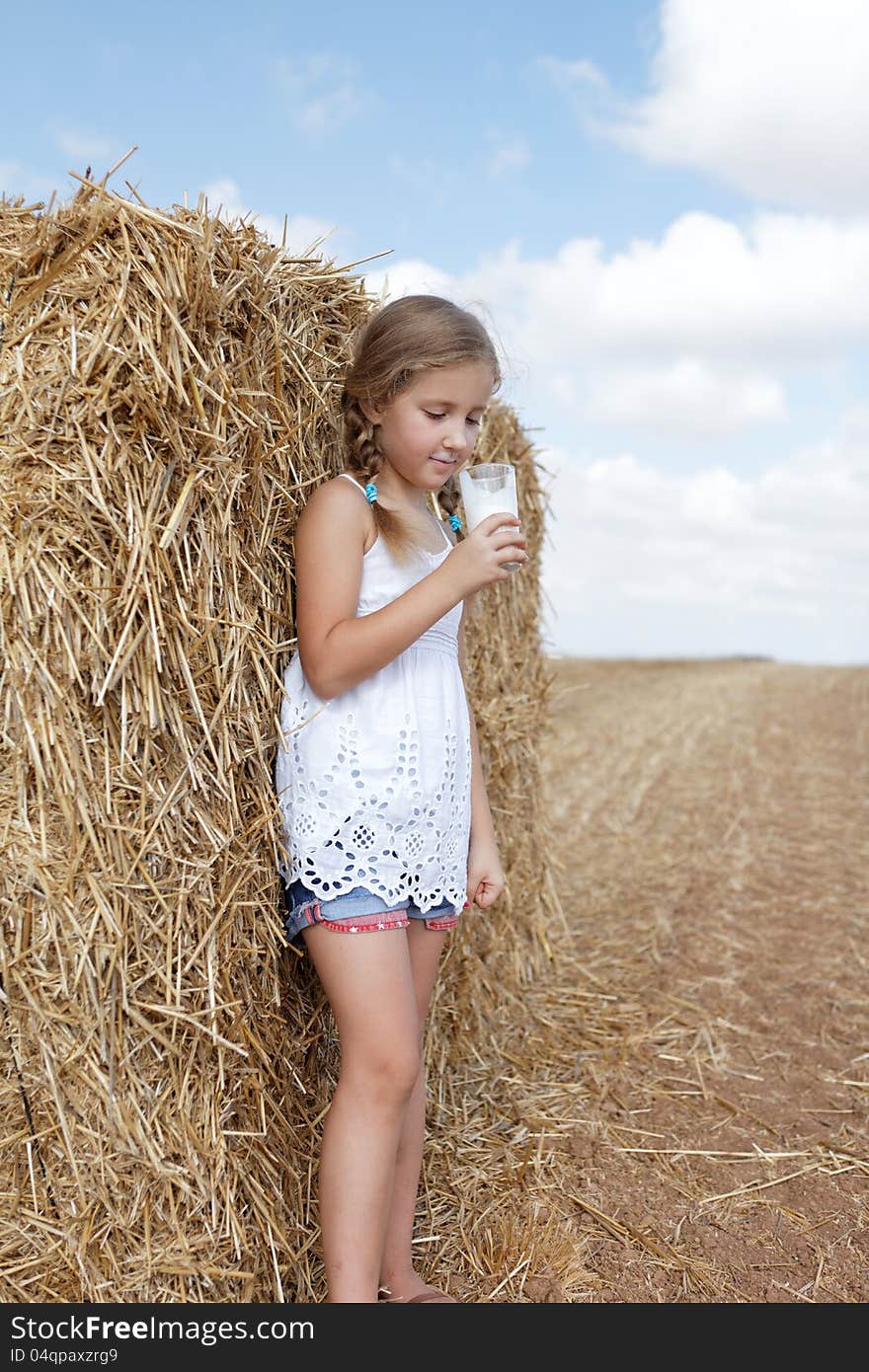 Girl with a glass of milk