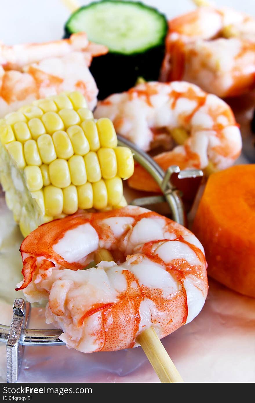 Shrimp and corn string together. Shrimp and corn string together.