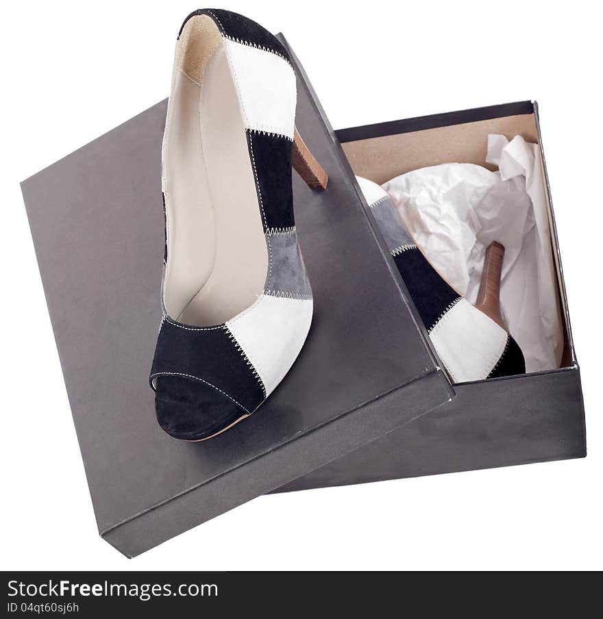 High heels in a box isolated