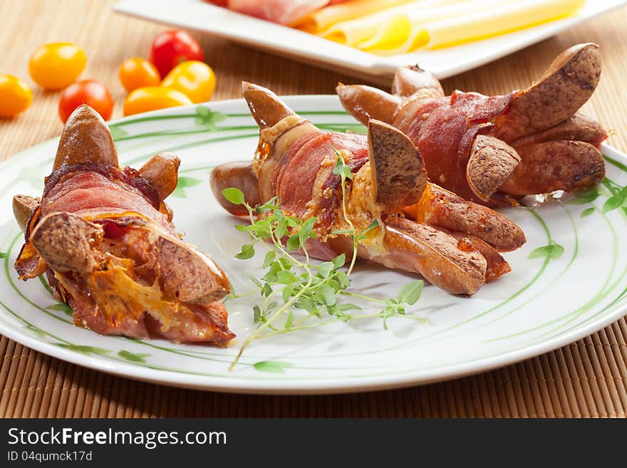 Tasty Sausages With Bacon, Cheese