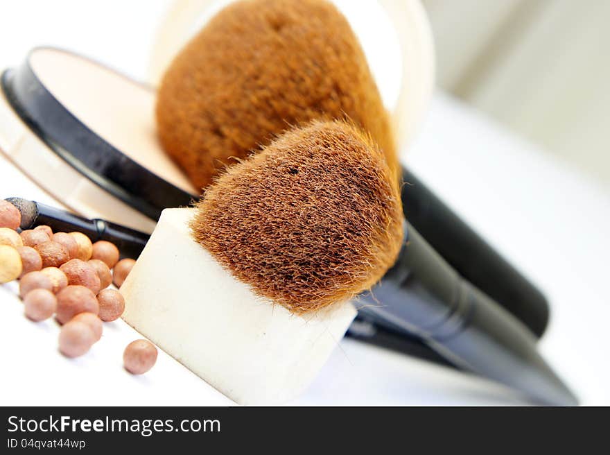 Makeup room: makeup foundation, powder, bronzer and brushes