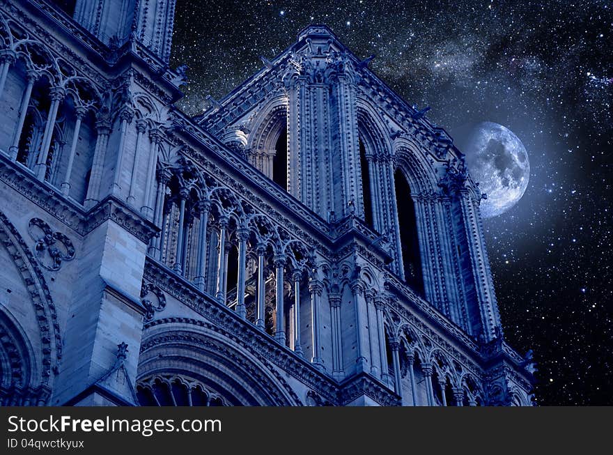 Notre-Dame cathedral of Paris at night, under the moonlight. Notre-Dame cathedral of Paris at night, under the moonlight.