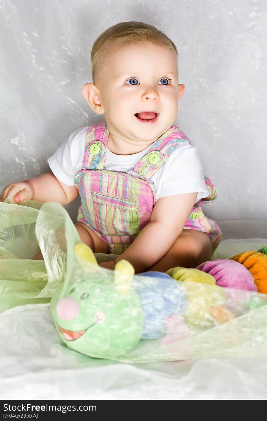 Little Girl With Toy Caterpillar