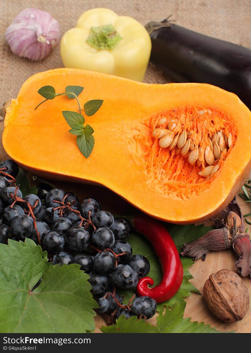 Autumn vegetable and fruits on old wood. Autumn vegetable and fruits on old wood