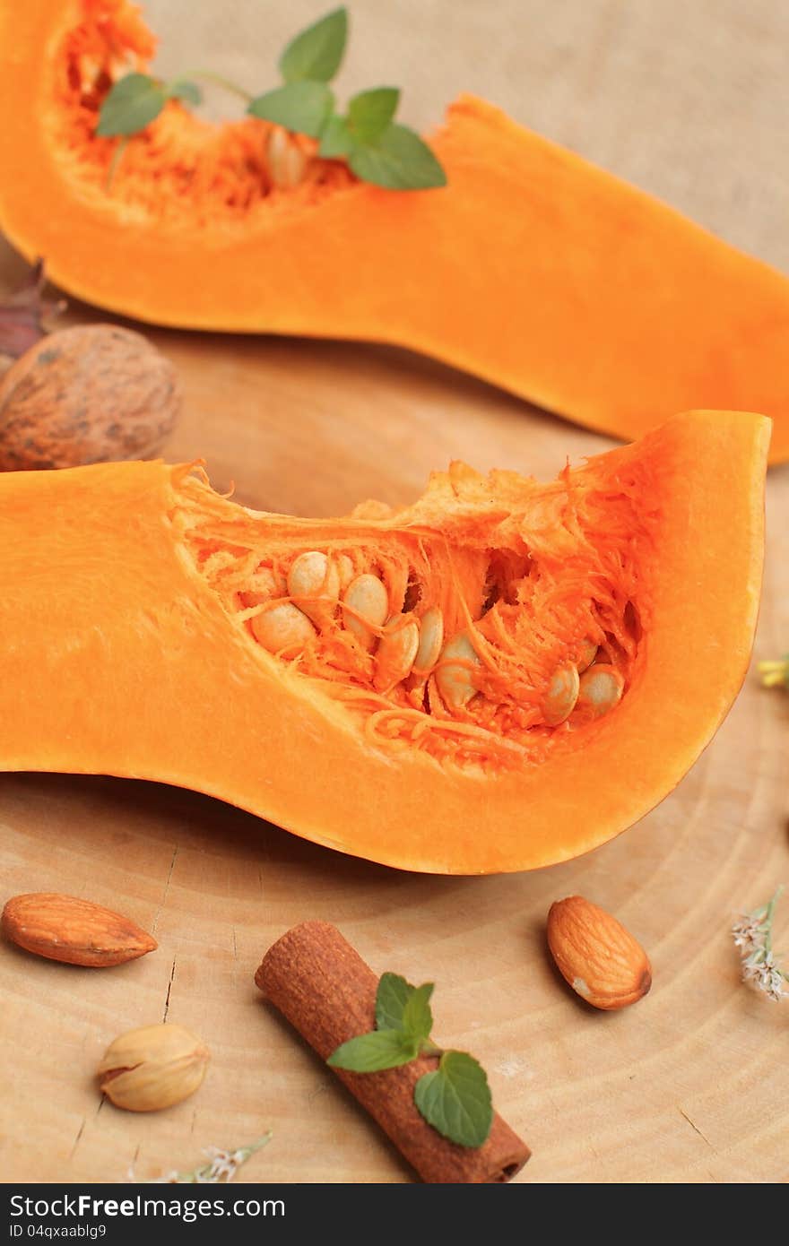 Fresh pumpkin and mix of nuts for pumpkin pie. Fresh pumpkin and mix of nuts for pumpkin pie