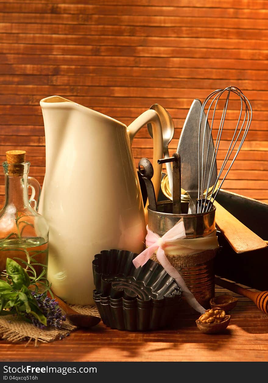 Old kitchen cooking utensil in rustic decor