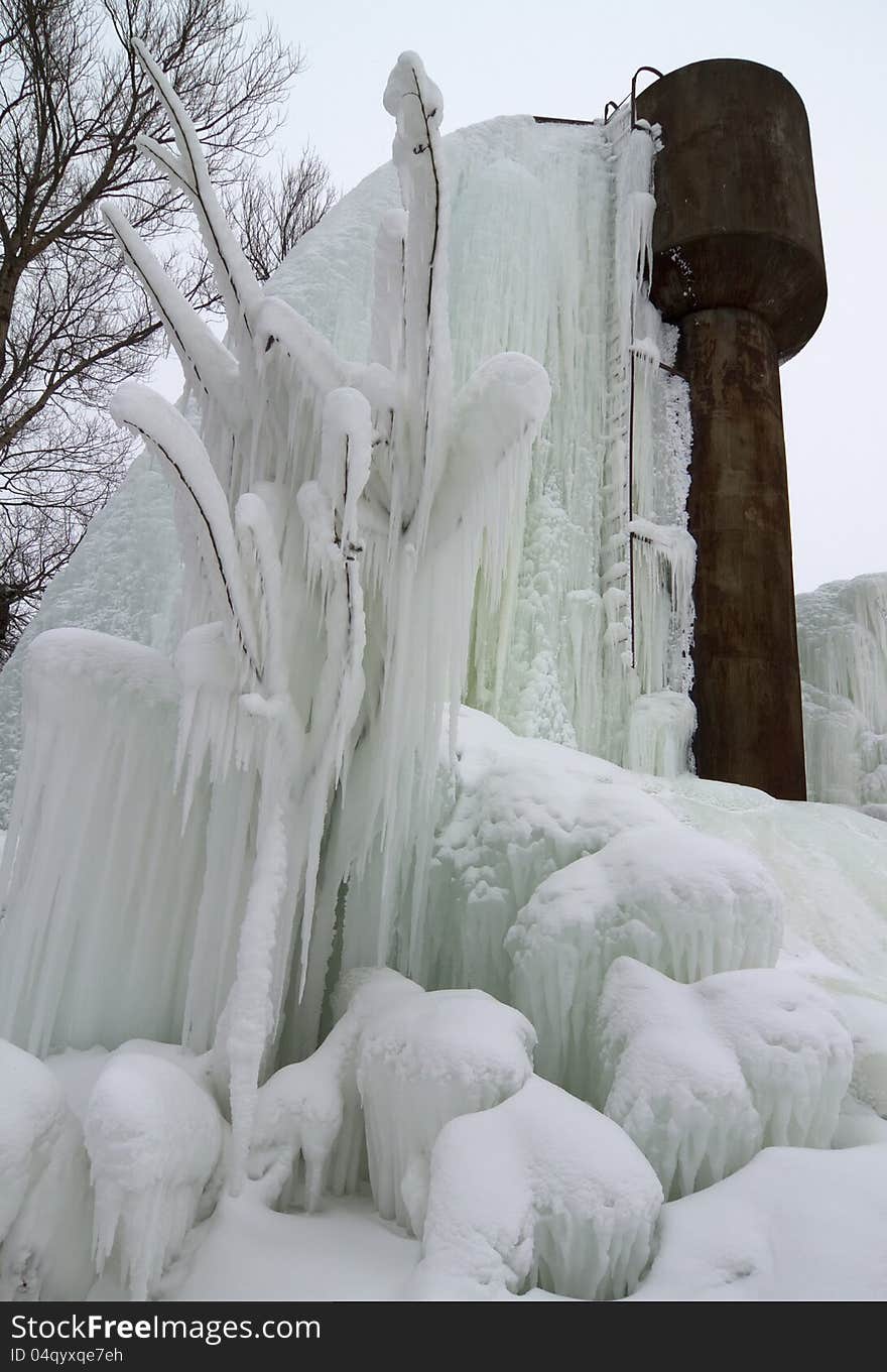 Frozen broken water tower in winter