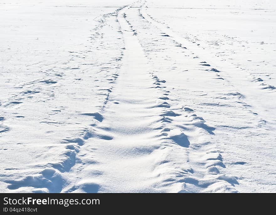 Snowbound trace of a car. Snowbound trace of a car