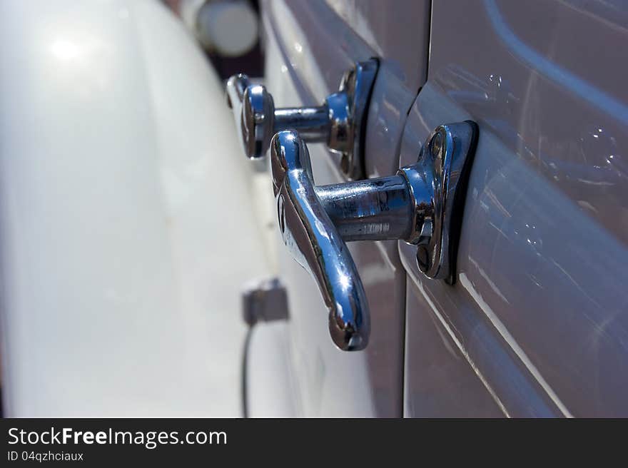 Chrome door handles on antique auto