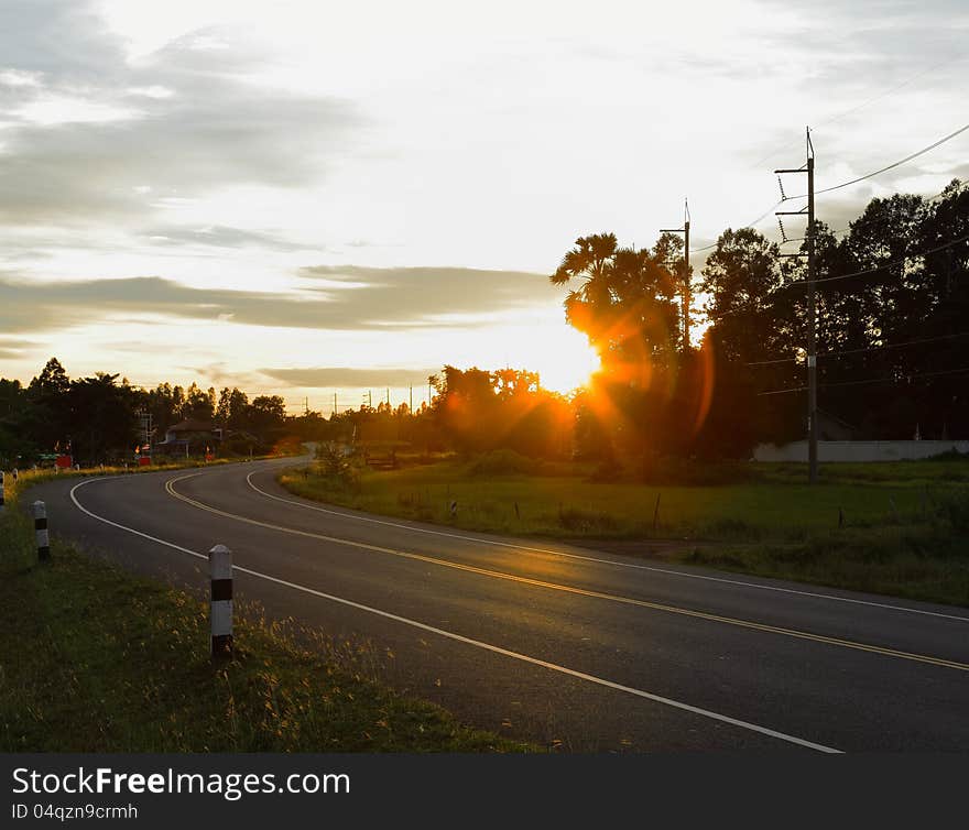 Light vehicles on the road in the evening. Light vehicles on the road in the evening.