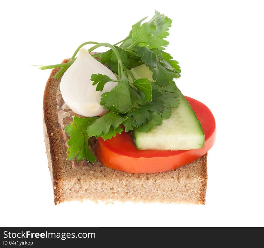 Rye-bread with tomato and canned fish. Isolated on a white background.