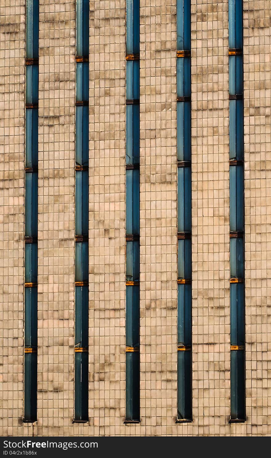 The wall of old office building with windows. The wall of old office building with windows