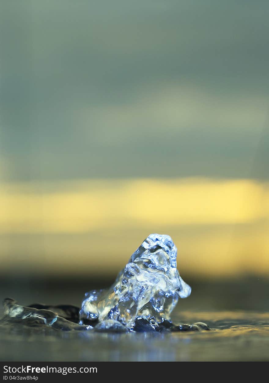 Close up of water splash in stunning light