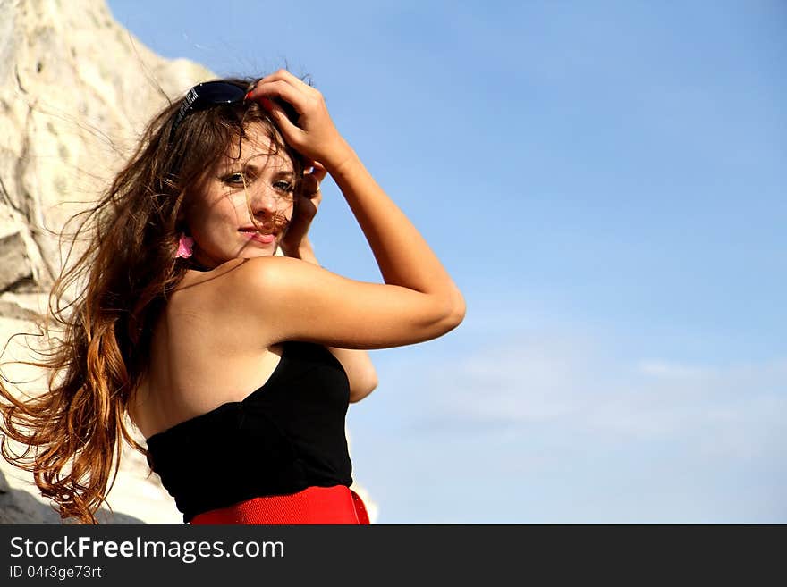 Beauty girl on the rock