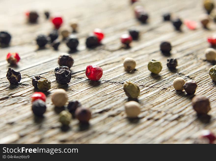 Peppercorn mix on vintage worn wooden table