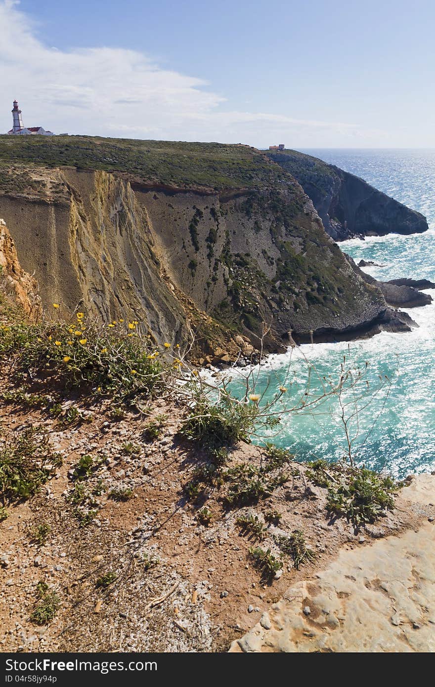 View of the beautiful lighthouse of Cape Espichel, Sesimbra, Portugal.