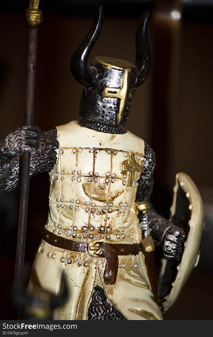 Macro view of a cool miniature medieval warrior. Macro view of a cool miniature medieval warrior.