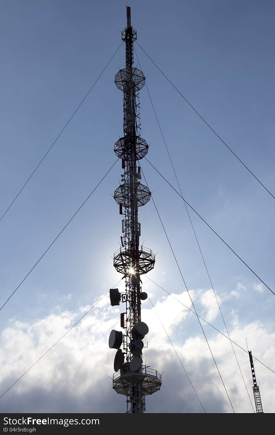 Telecommunication tower and blue sky