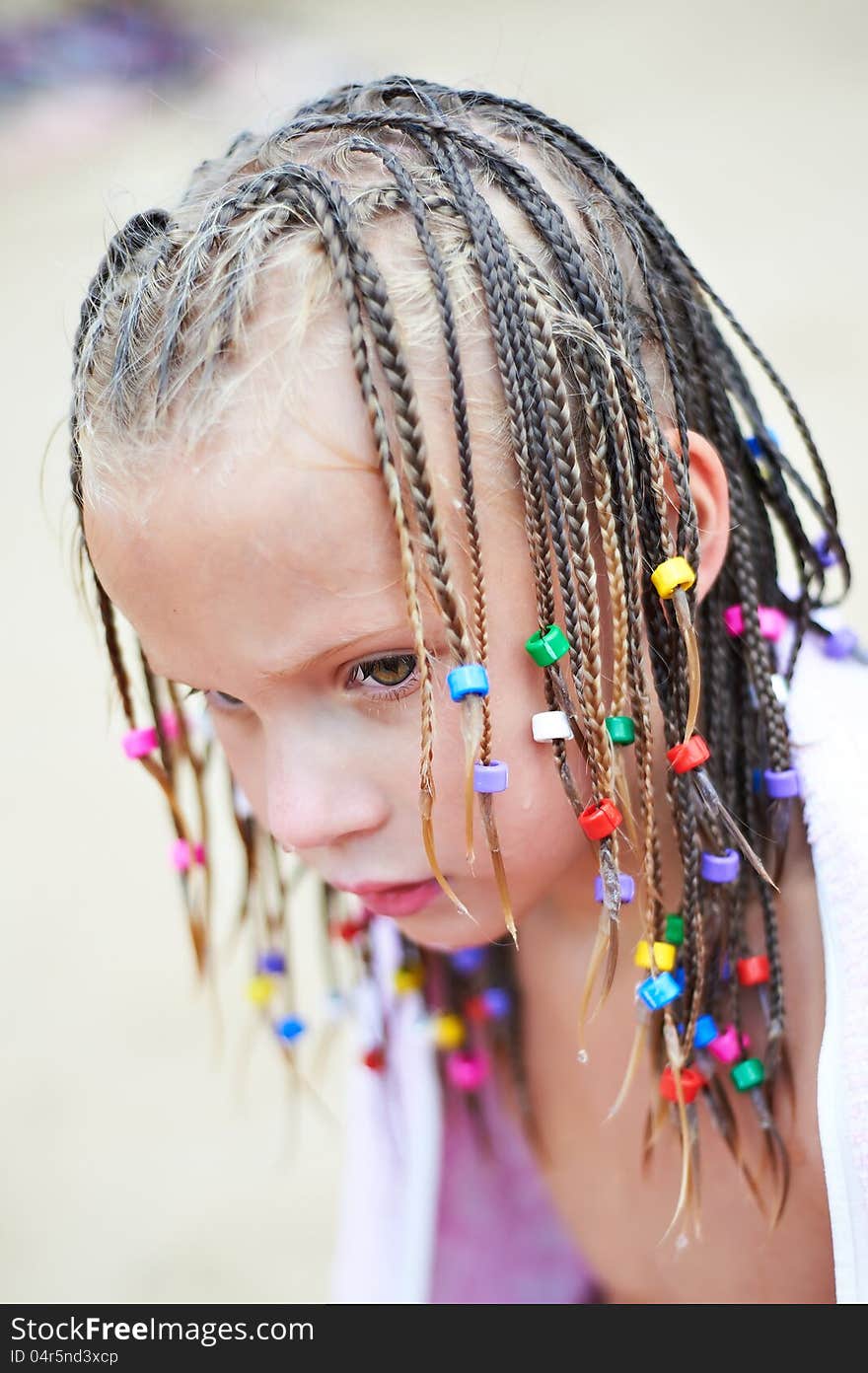 Portrait of a girl with colorful pigtails. Portrait of a girl with colorful pigtails