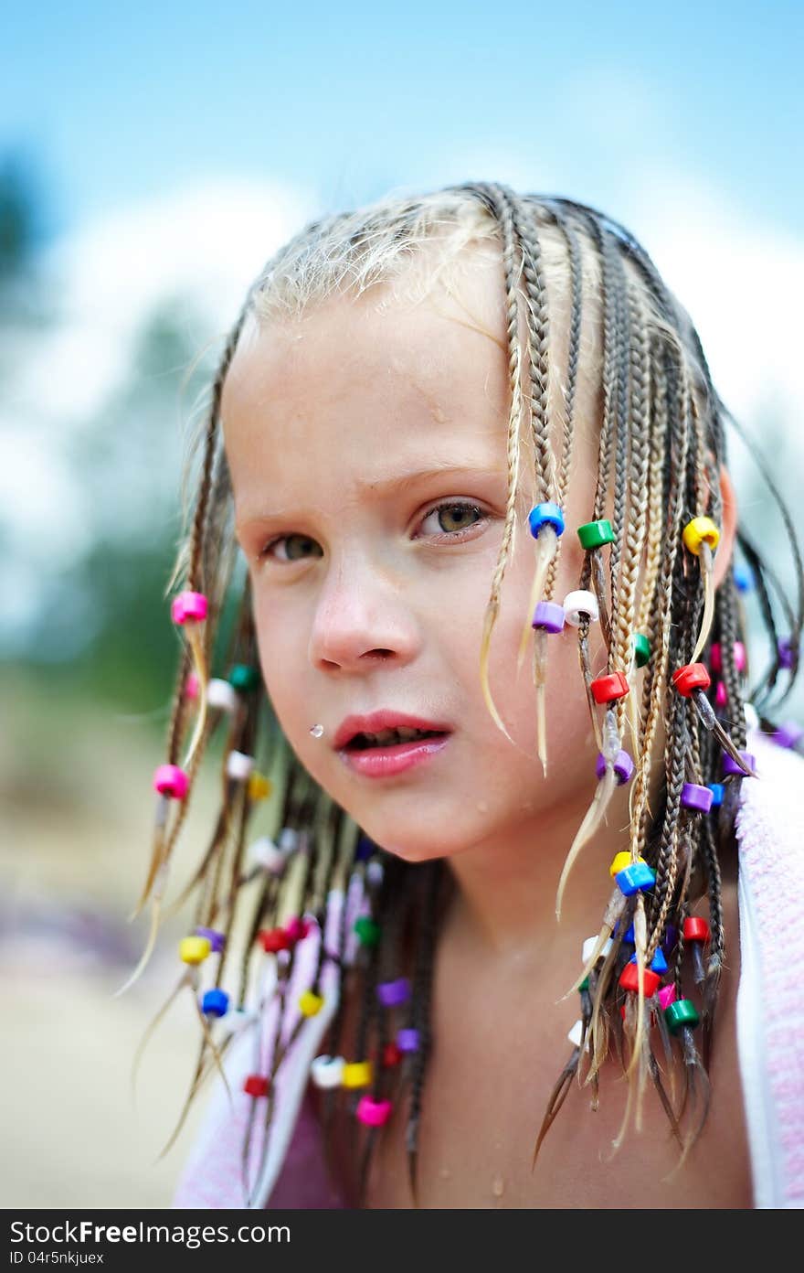 Portrait of a girl with pigtails