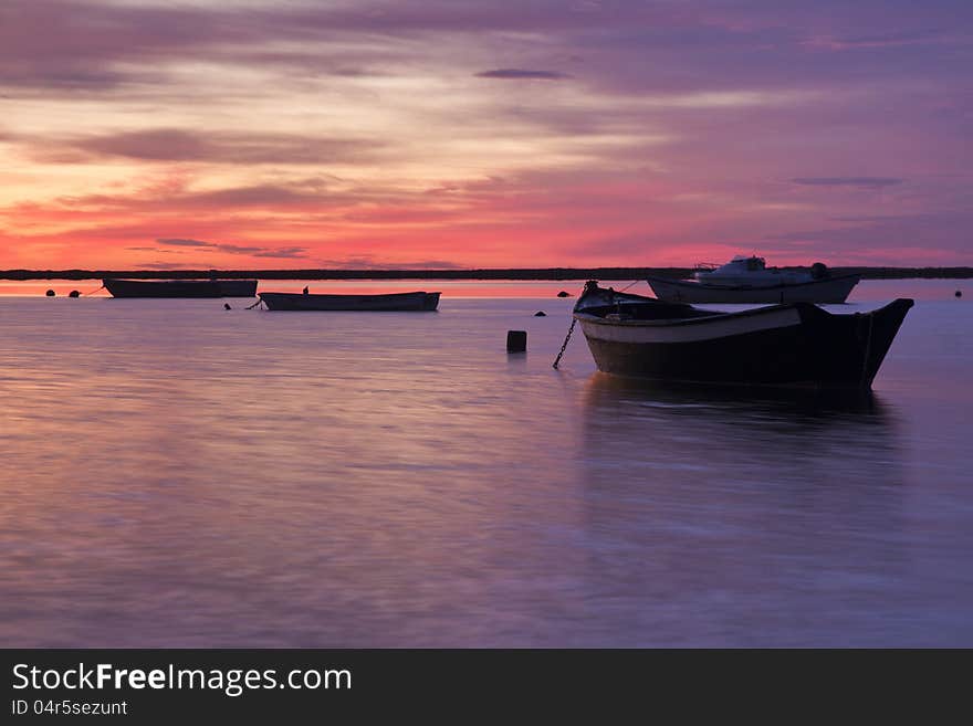 Sunrise with fishing boats