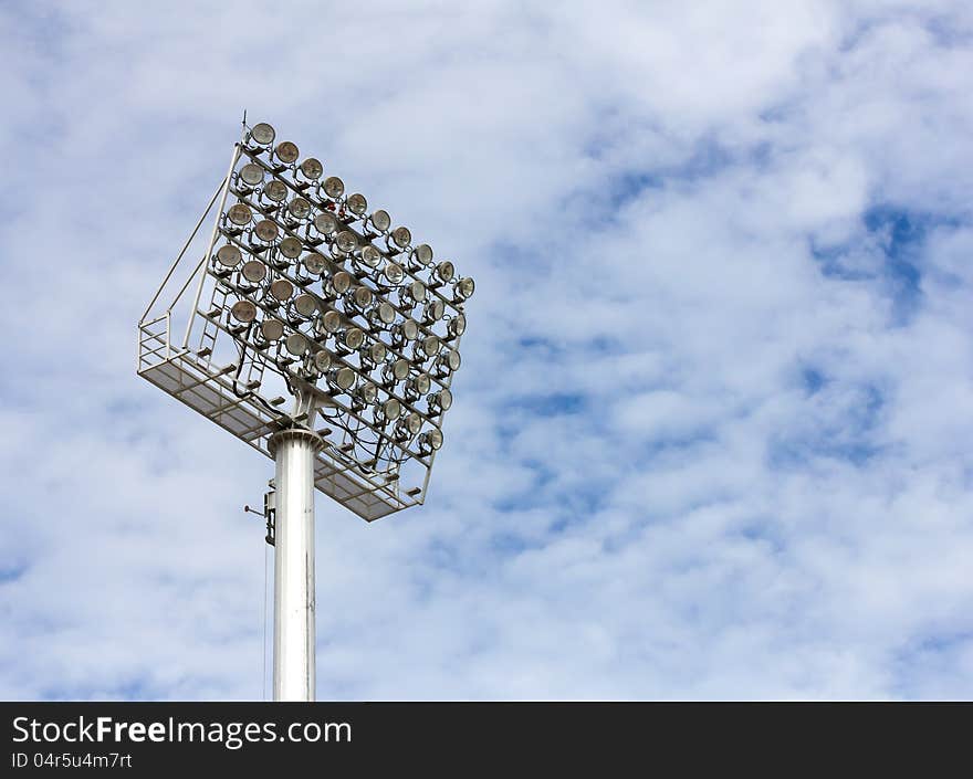 The Stadium Spot-light tower over Blue Sky