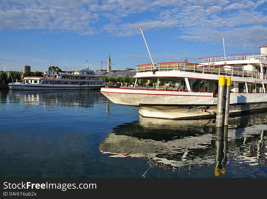 The German city of Constance. Bodensee ferryboat harbour, morning light. The German city of Constance. Bodensee ferryboat harbour, morning light.