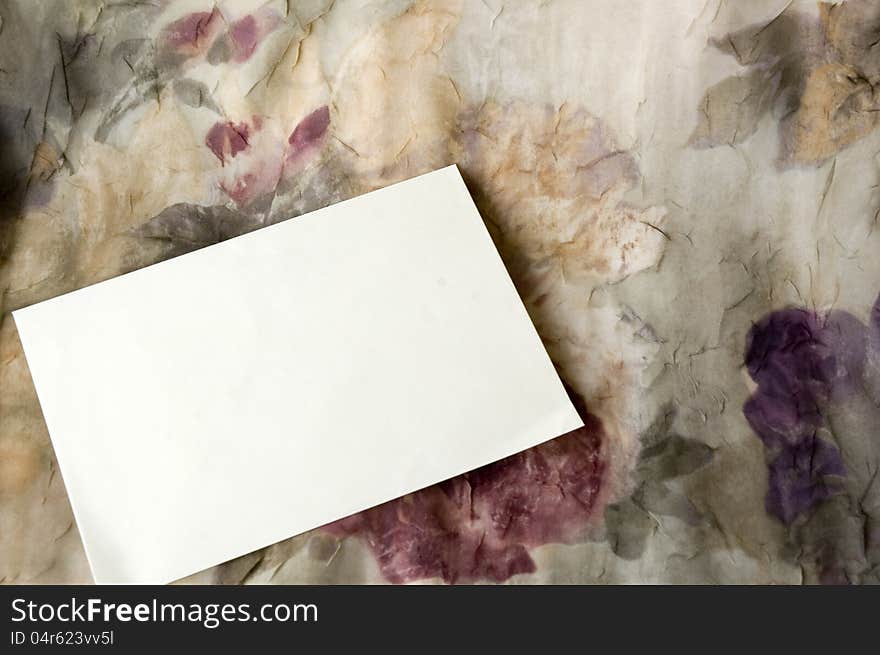 Blank card on floral background