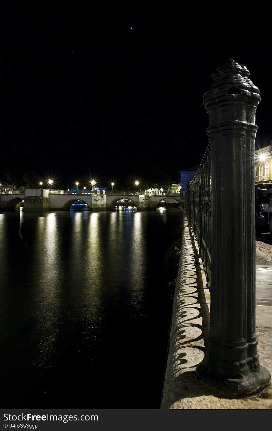 View of beautiful Tavira city in the night located in the Algarve, Portugal. View of beautiful Tavira city in the night located in the Algarve, Portugal.