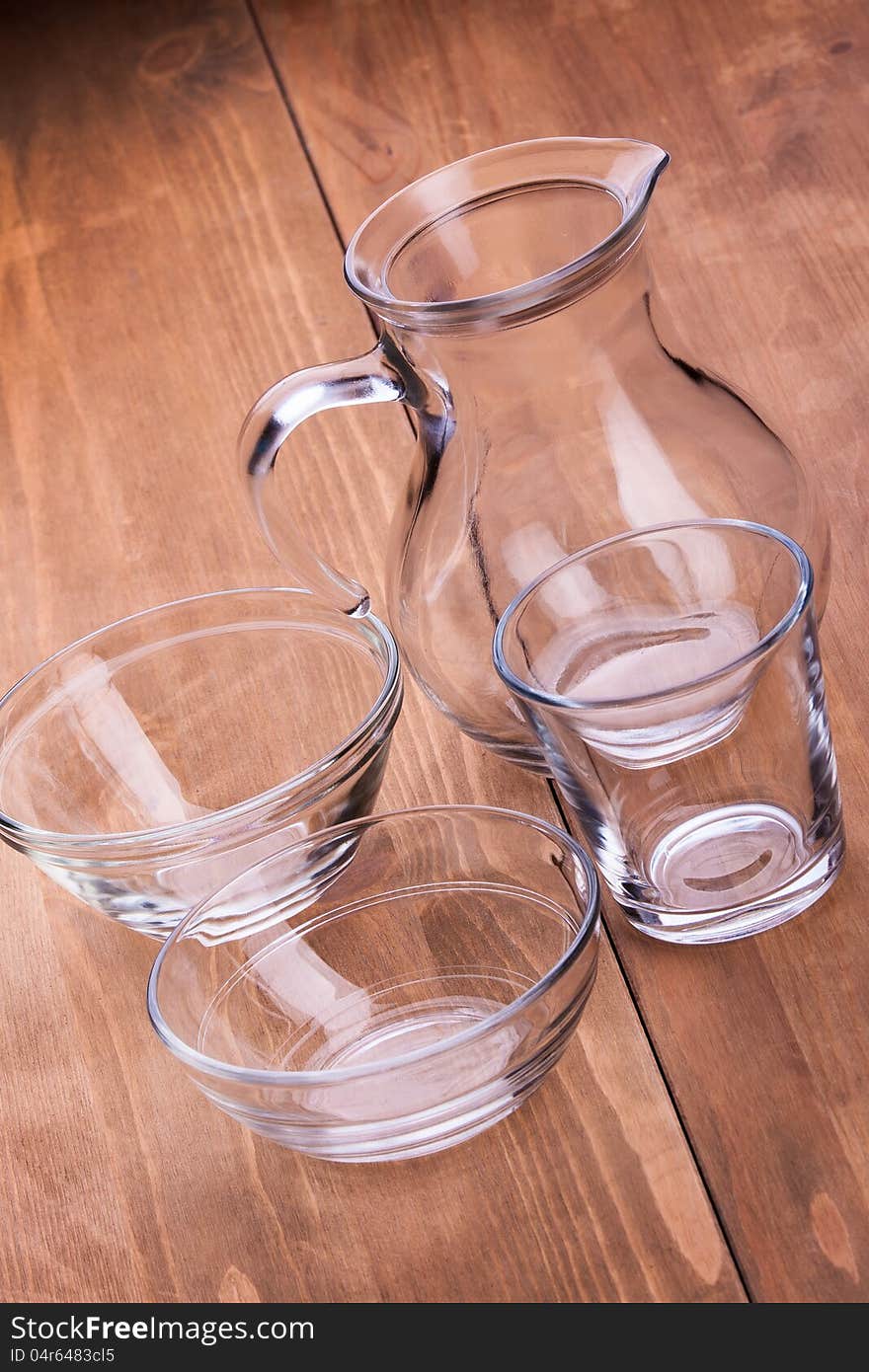 Empty clean glassware on a wooden table