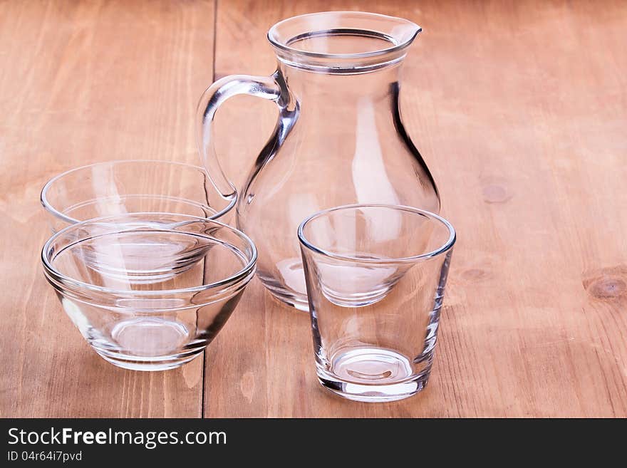 Empty clean glassware on a wooden table