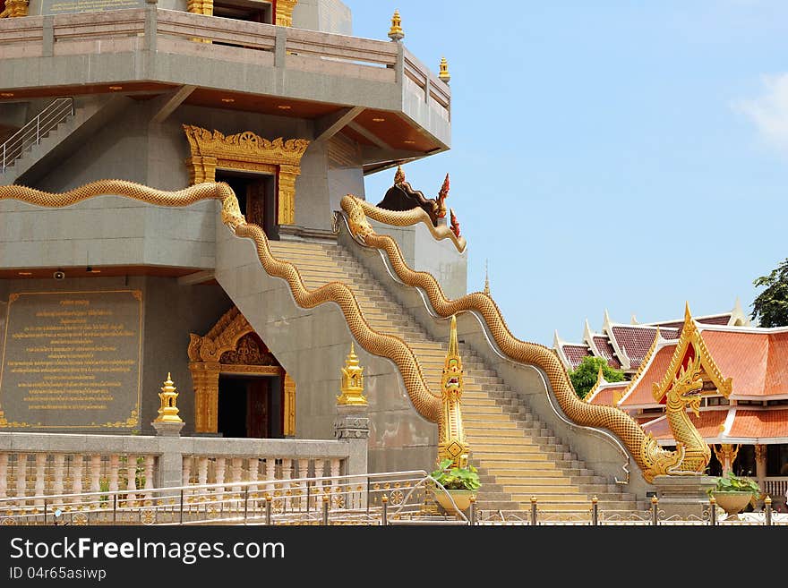 Staircase with Naka leading to room of pagoda, at Thai Buddhist temple in Northeast of Thailand