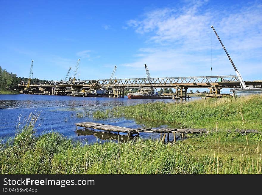 Construction of a new bridge over the river. Construction of a new bridge over the river