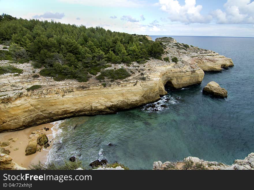 View of the beautiful natural coastline of the region of Lagoa, Algarve, Portugal. View of the beautiful natural coastline of the region of Lagoa, Algarve, Portugal.