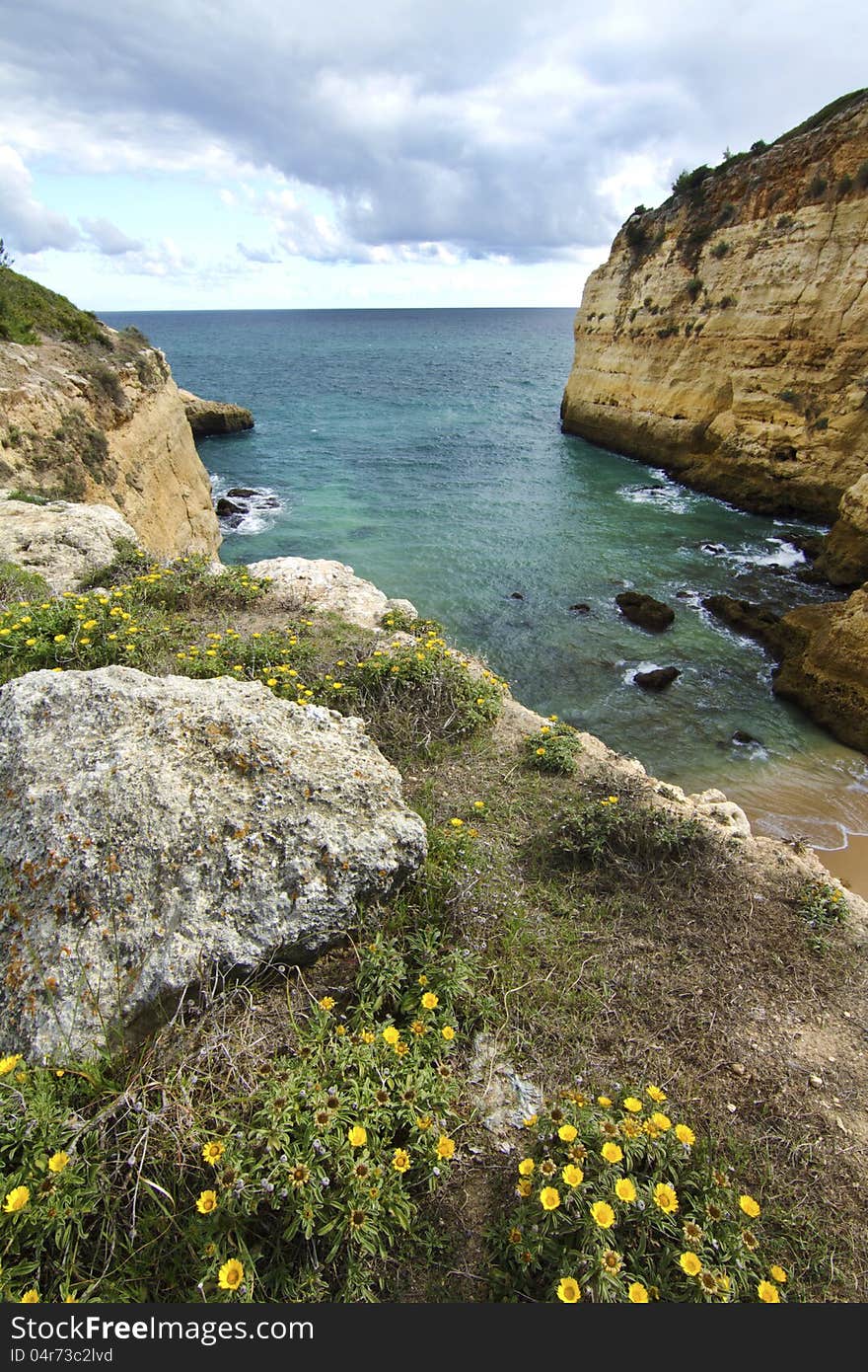 View of the beautiful natural coastline of the region of Lagoa, Algarve, Portugal. View of the beautiful natural coastline of the region of Lagoa, Algarve, Portugal.