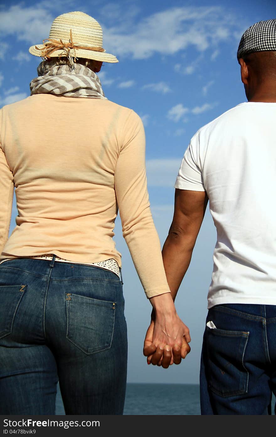 Image of a couple holding hands. Image of a couple holding hands