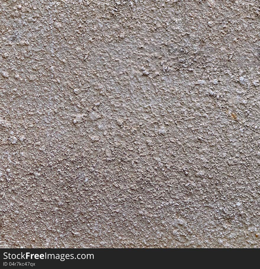 Concrete wall fragment. May be used as background or texture. Concrete wall fragment. May be used as background or texture.