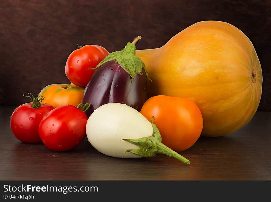 Fresh vegetables on the dark background