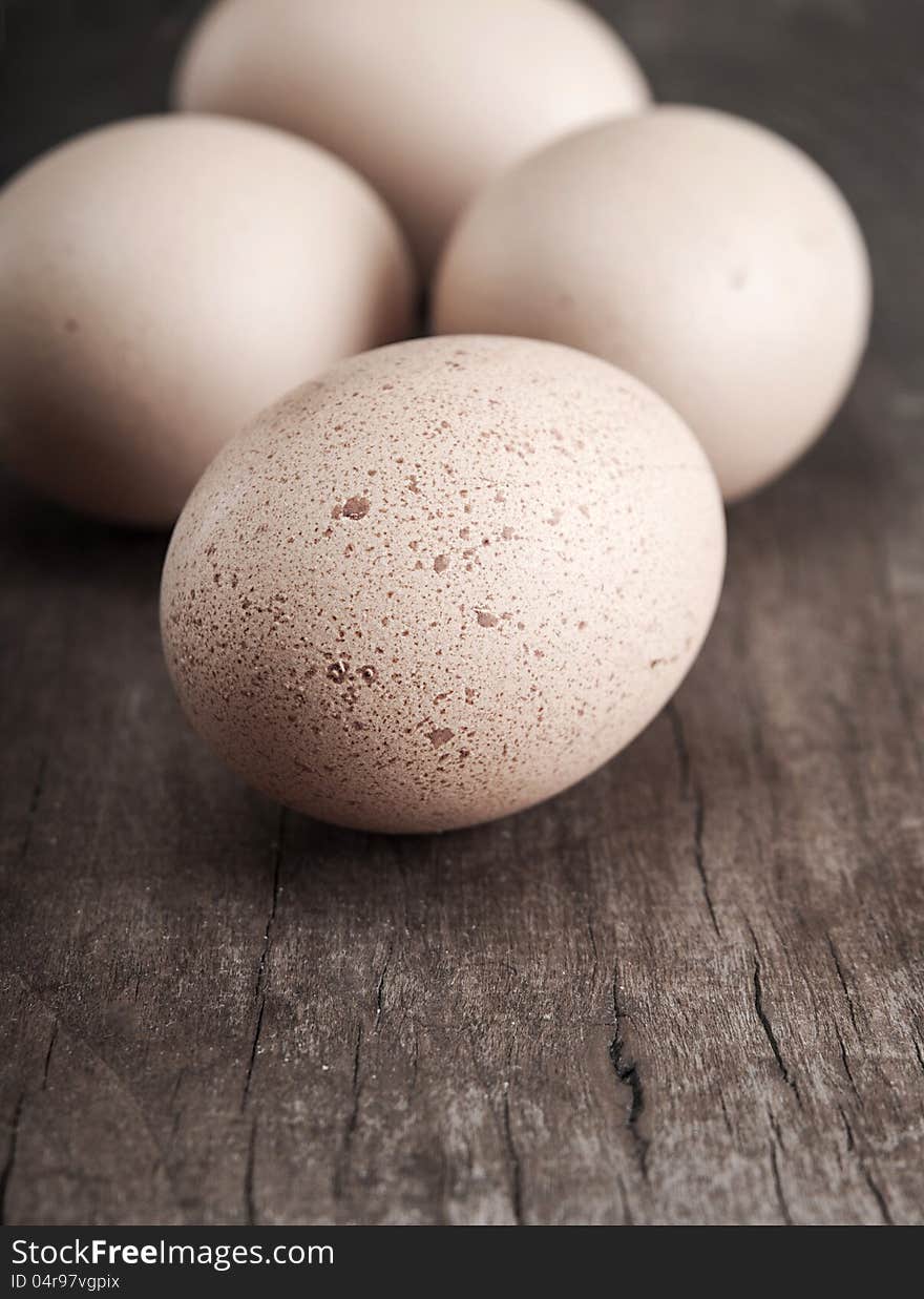 Eggs on the old wooden table. Eggs on the old wooden table