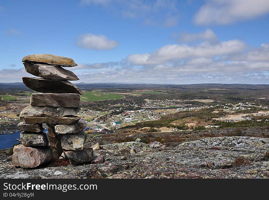 Many such monuments dot the hillsides and mountains around Newfoundland as a way of telling people that somebody was at this point. This particular sits on a mountain top overlooking Bay Bulls Near St John's Newfoundland in Canada. Many such monuments dot the hillsides and mountains around Newfoundland as a way of telling people that somebody was at this point. This particular sits on a mountain top overlooking Bay Bulls Near St John's Newfoundland in Canada.