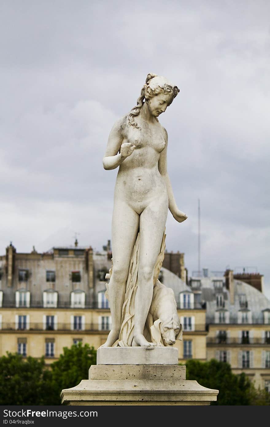 Beautiful statues located on the Museum of the Louvre in Paris, France