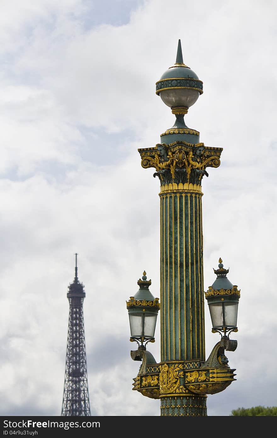 View of a beautiful detailed column in Place de la Concorde, Paris, France. View of a beautiful detailed column in Place de la Concorde, Paris, France.