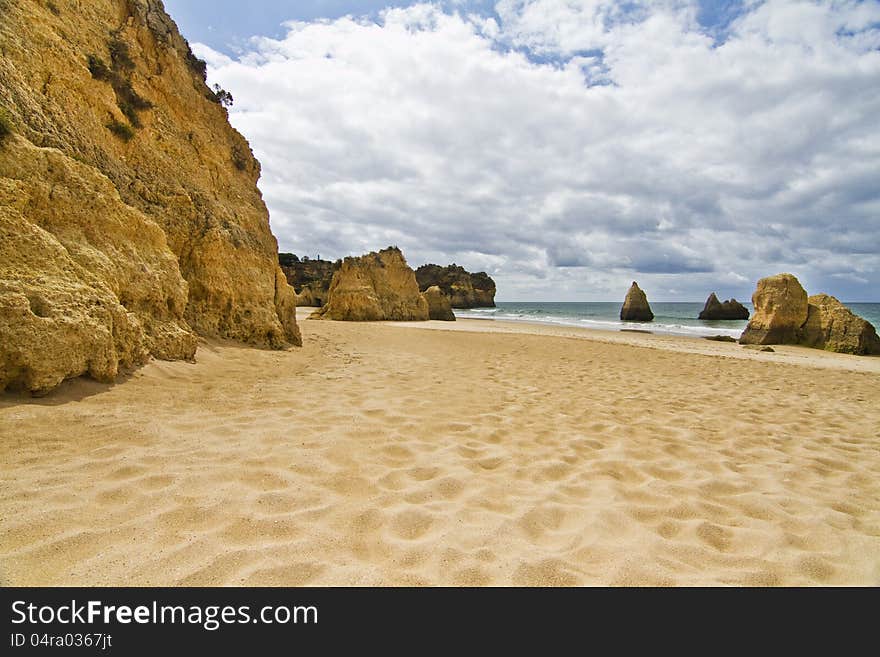 Wonderful view of a beautiful beach in the Prainha area, in the Algarve, Portugal. Wonderful view of a beautiful beach in the Prainha area, in the Algarve, Portugal.