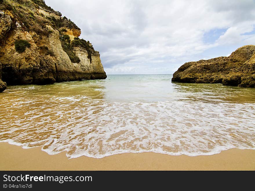 Wonderful view of a beautiful beach in the Prainha area, in the Algarve, Portugal. Wonderful view of a beautiful beach in the Prainha area, in the Algarve, Portugal.