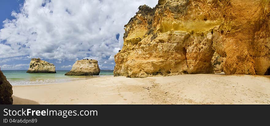 Wonderful view of a beautiful beach in the Prainha area, in the Algarve, Portugal. Wonderful view of a beautiful beach in the Prainha area, in the Algarve, Portugal.