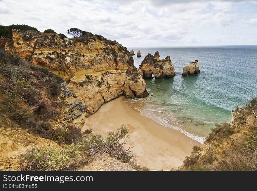 Wonderful view of a beautiful beach in the Prainha area, in the Algarve, Portugal. Wonderful view of a beautiful beach in the Prainha area, in the Algarve, Portugal.